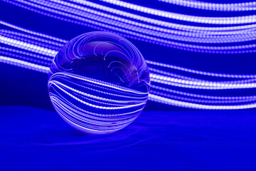 Glass ball with abstract light for design. Dark abstract background.