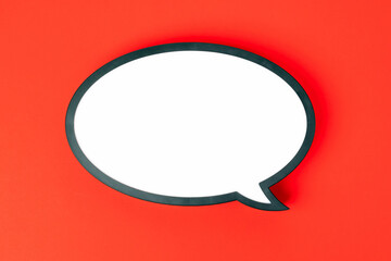 Blank speech bubble isolated on red background. Nobody
