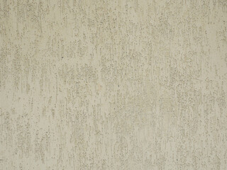 Wall with decorative textured beige cladding.Texture not seamless. Fullscreen photo