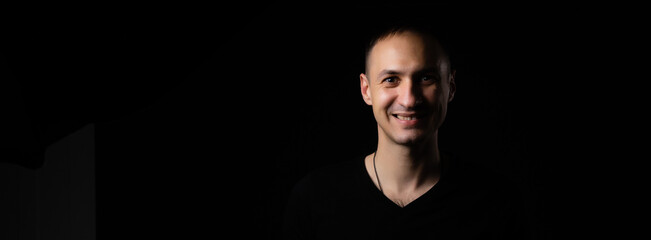 portrait of a man black background