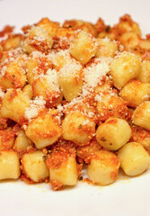 Italian cooked gnocchi in white plate