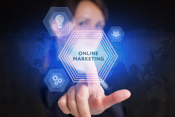 Business, Technology, Internet and network concept. Young businessman working on a virtual screen of the future and sees the inscription: Online marketing