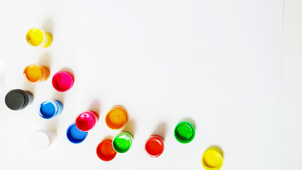 Gouache Paint cans on a white background. copy space
