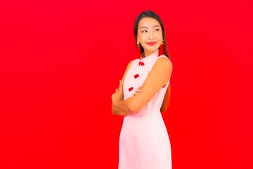 Fototapeta na wymiar Portrait beautiful young asian woman wear chinese new year clothing