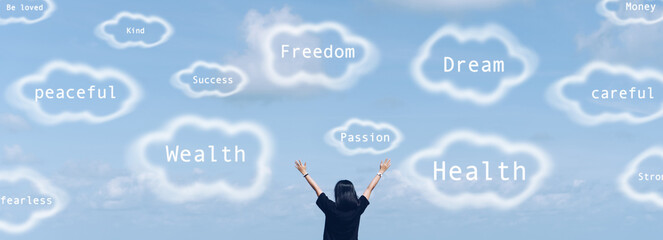 Woman rise hand up to sky with thinking or dreaming to successful.