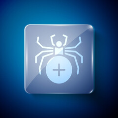 White Spider icon isolated on blue background. Happy Halloween party. Square glass panels. Vector.