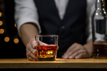 Bartender Serve Whiskey, on wood bar, 