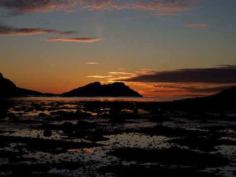 sunset over the sea. Photo taken from L&aring;ter at the northern Norwegian coast, in October 2020. 