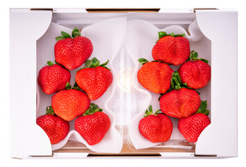 Red Strawberry packaging ready to sell, Fresh Amaoh Strawberry in the box on White Background.