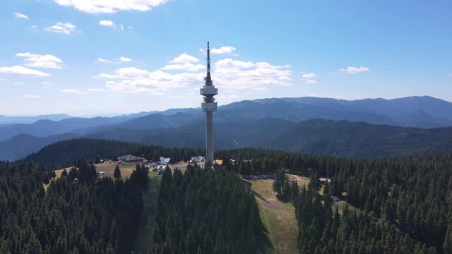 Aerial view of Rhodope Mountains and Snezhanka tower near resort of Pamporovo, Smolyan Region, Bulgaria