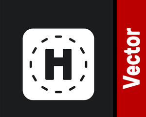 Obraz premium White Helicopter landing pad icon isolated on black background. Helipad, area, platform, H letter. Vector.