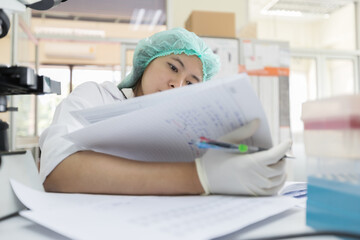 The scientists working in the laboratory