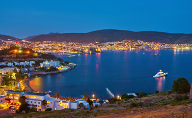Fototapeta premium Night view to the bay and the cityscape of Bodrum