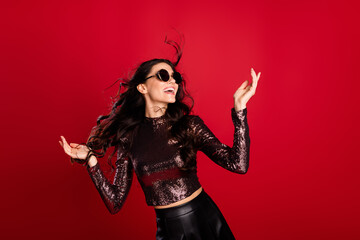 Photo of charming gorgeous woman raise hands celebrate christmas mood isolated on red color background