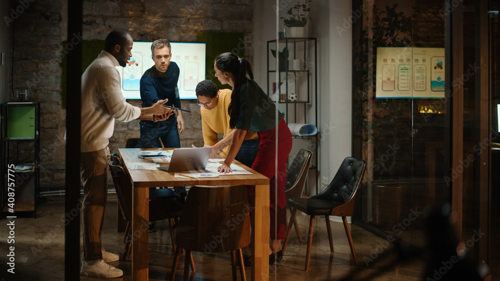 Poster Diverse Multiethnic Team are Having a Conversation in a Meeting Room Behind Glass Walls in a Creative Office. Colleagues Lean On a Conference Table and Discuss Business, App User Interface and Design.