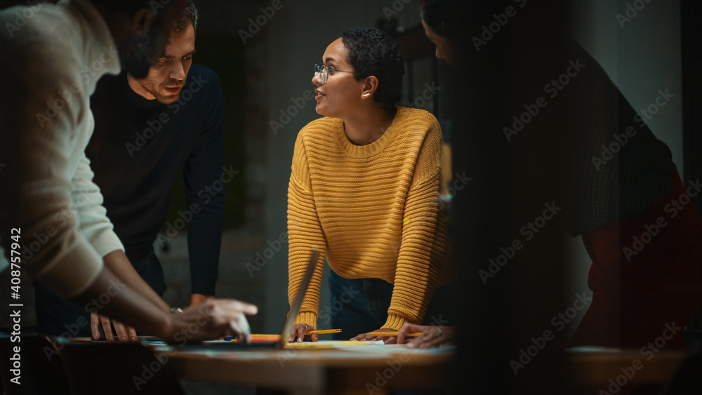 Leinwandbilder diverse multiethnic team are having a conversation in a meeting room behind glass walls in a creativ