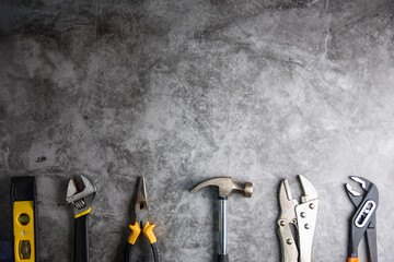 Construction tools on Gray-black cement floor background with copy space.Home Repair concept, Repair maintenance concept, Renovation concept. - 408758108