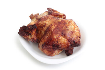 Fried chicken on a plate. Isolated object on white background