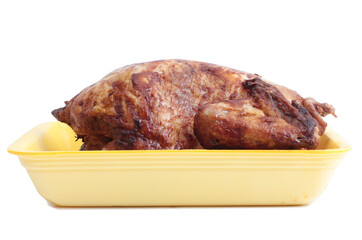 Fried chicken on a plate. Isolated object on white background