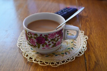 cup of coffee with milk on morning breakfast