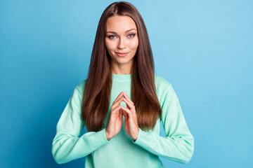 Photo portrait of evil genius woman scheming with fingers touching isolated on pastel blue colored...