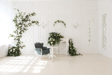 luxury delicate interior of the living room and bedroom in light colors with expensive chic carved furniture in classic style