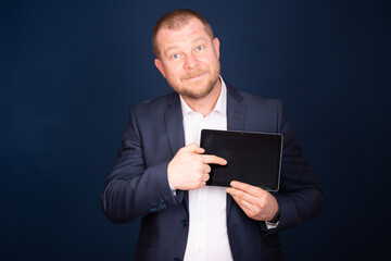 Businessman using tablet, double exposure with network