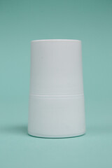 white packaging deodorant triangular shape with a place logo