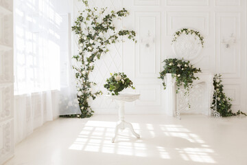 luxury delicate interior of the living room and bedroom in light colors with expensive chic carved furniture in classic style