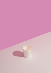 Trending colors. Design of white cup on white table on pink background. Copy space