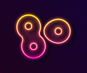 Glowing neon line Cell division process icon isolated on black background. Vector.