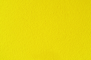 Obraz premium Yellow cement or concrete wall texture background.