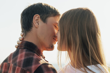 Closeup of a beautiful passionate couple want to kiss while dating. 