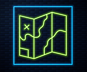 Glowing neon line Folded map icon isolated on brick wall background. Vector.