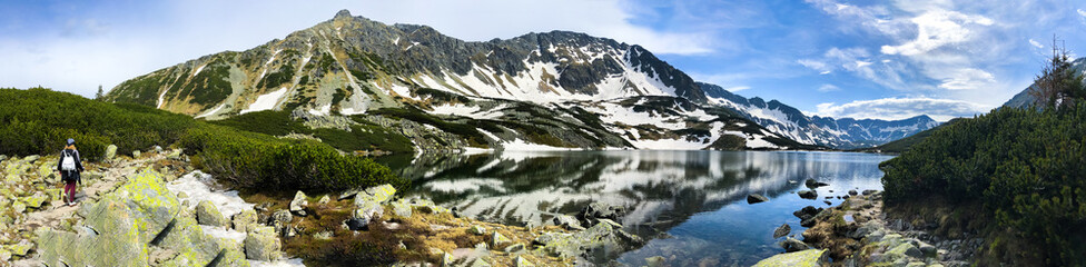 Panoramic view of the Morskie Oko lake with the Tatra mountains in the background