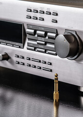 The audio amplifier panel. One large pen is in focus. In the background, you can see the handles...