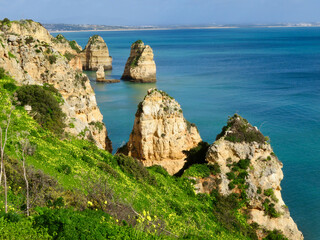 Beautiful stretches of coastline at Lagos, Algarve, Portugal, with cliffs, sand and sea
