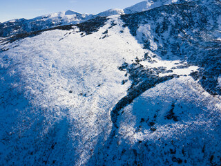 Aerial winter view of Kupens and Orlovets peaks, Rila Mountain