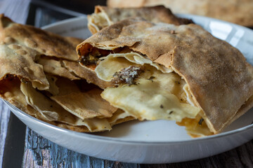 Pizza Puff with Anchovies. Traditional peasant dish.