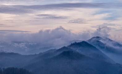 Fototapeta na wymiar Landscape of mountains in clouds.