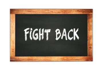 Fototapeta premium FIGHT BACK text written on wooden frame school blackboard.