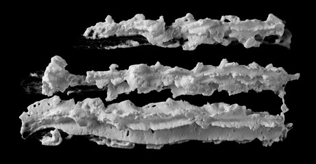 White whipped cream frosting for cake isolated on black background, top view with clipping path