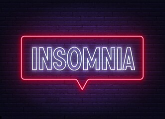 Insomnia neon sign on brick wall background .