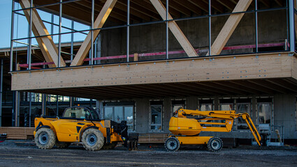Vendée, France; January 17, 2021: a telescopic cart and a nacelle on the construction site of the future high school of Saint Gilles Croix de Vie.