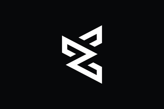 EZ logo letter design on luxury background. ZE logo monogram initials letter concept. EZ icon logo design. ZE elegant and Professional letter icon design on black background. E Z ZE EZ