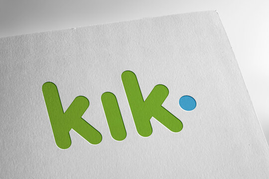 kik logo on textured paper