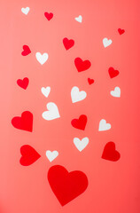 Hearts on a red background. Background for Valentine's Day, postcard.
