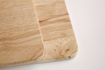 Mini wooden chopping board isolated white background