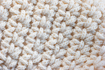 Woven knitted wool cotton fabric background texture macro close up shot top view