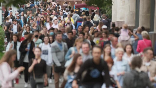 Crowd of people on the street. No recognizable faces